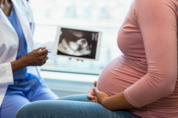 pregnant women at doctors