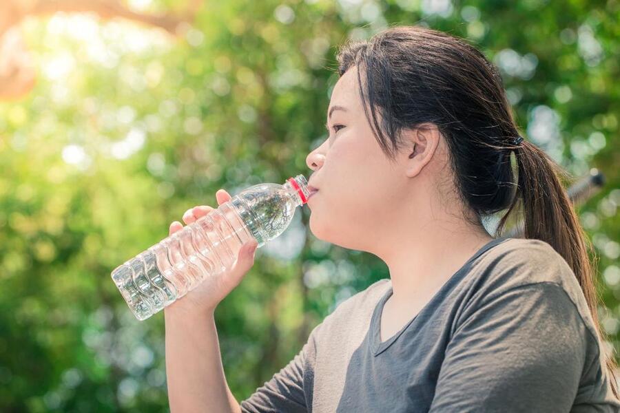 Drinking copious quantities of water and wearing breathable, lightweight fabrics makes is safer to exercise outdoors.  (DREAMSTIME)