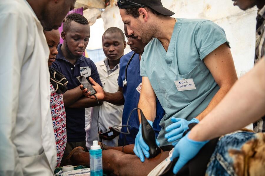 Dr. William Cherniak with a patient