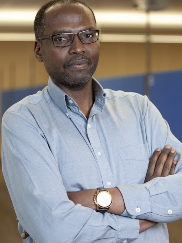 man with glasses looking at camera