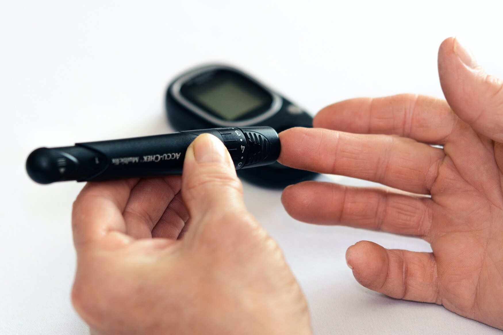 Image of someone checking their blood sugar levels