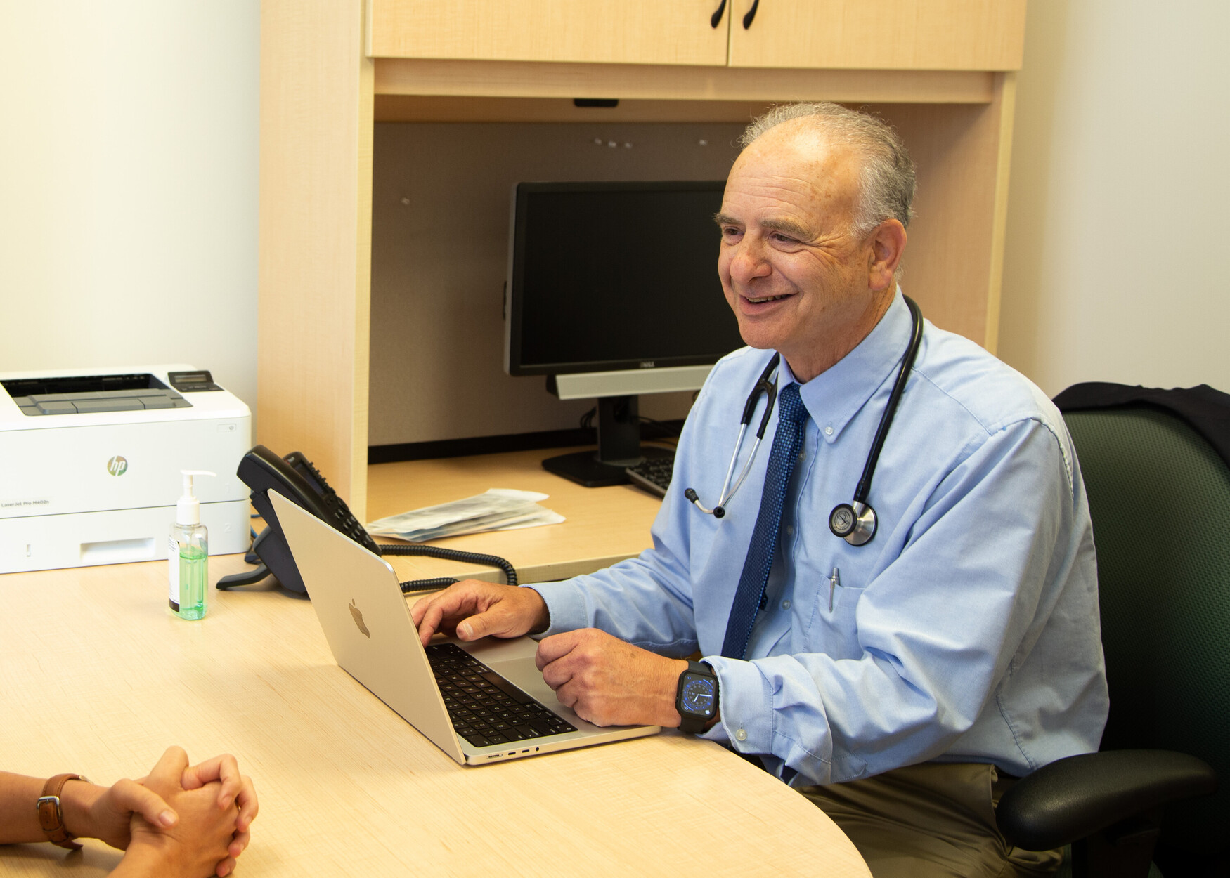 Dr. David Tannenbaum sitting at his desk