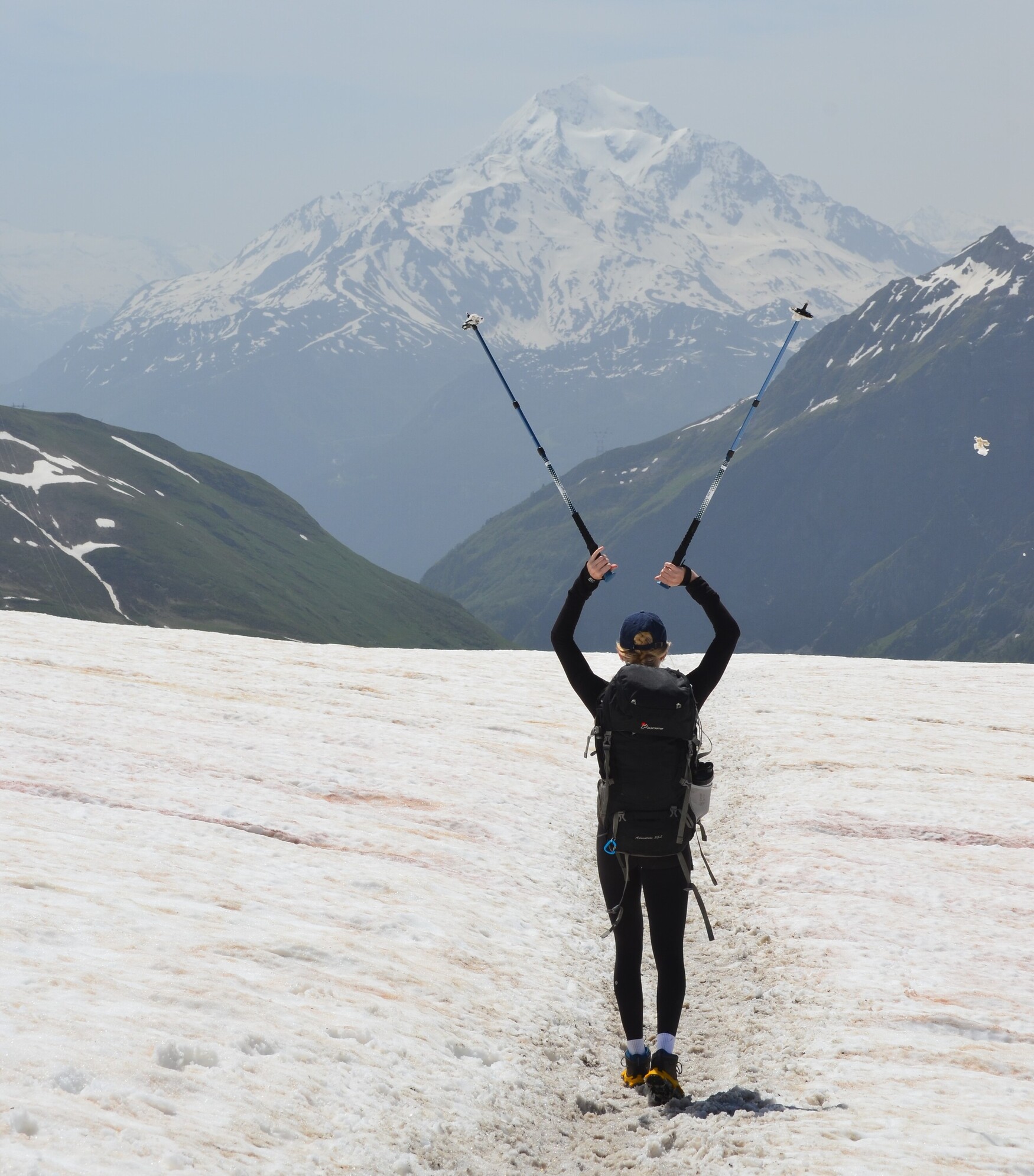 Dr. Leis facing a mountain