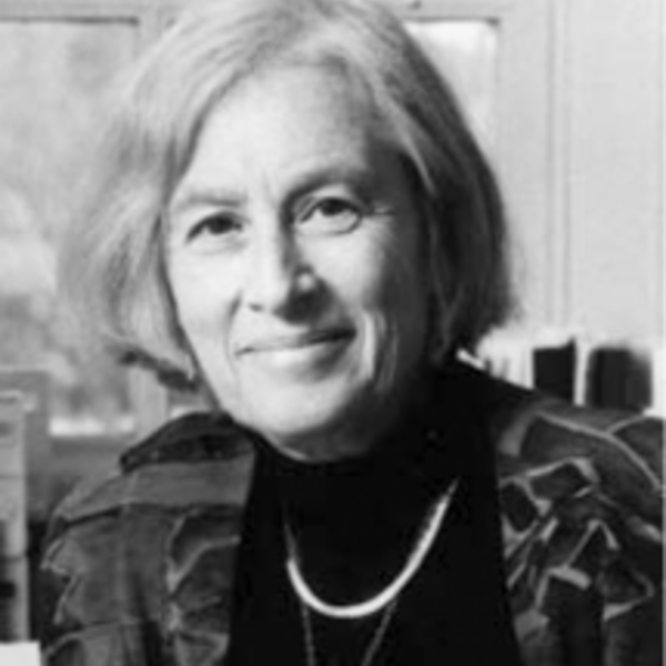 black and white photo of woman smiling at camera